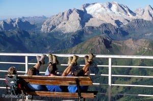 Group of runners relaxing on the deck of an Italian Hut