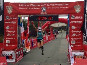 Ellie Greenwood jumping for joy at the 2012 UROC 100k finish.