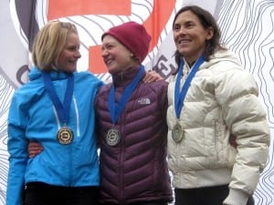 Hawker on the podium Anna Frost (left) and Kami Semick (right) after the 2010 TNF 50. Photo: iRunFar/Bryon Powell