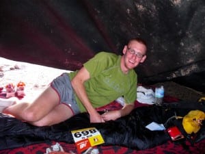 Me in the tent with my sleeping bag, race pack, ... and duck taped glasses (see below). Photo by Michael Wardian.