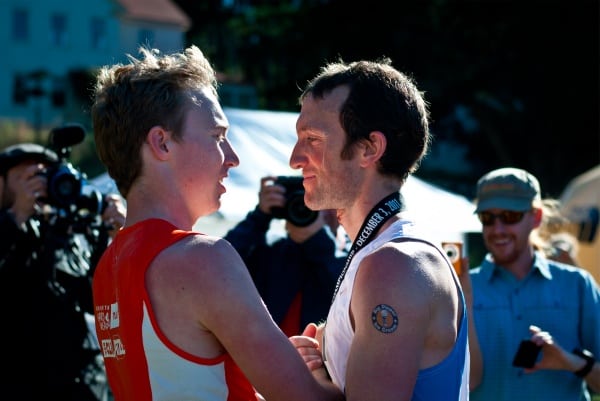 Dakota and Mike congratulate one another at the finish. Photo: Brett Rivers Dakota Jones Mike Wolfe 2011 TNF 50 mile finish