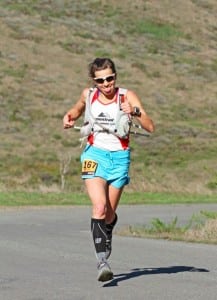 Ellie keeping her own (and everyone else's) spirit up on the course. Photo: Drymax