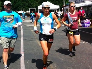 Ellie Greenwood leading the 2012 Western States 100 at Foresthill en route to a course-record-setting win.
