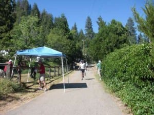 Arriving Michigan Bluff (mile 55) an hour ahead of goal pace. My son Joseph took care of me at this aid station and ran with me to entrance of trail.
