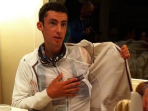 Kilian Jornet showing his 40 gram jacket. (it's the zipped jacket.)