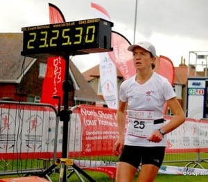 Lizzy Hawker running hard in the final hour of her 24-hour road running world record. ©CMUDC2011