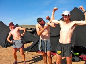 Bryon Powell along with his teammates Ted Archer and Michael Wardian after they placed third at the 2009 Marathon des Sables. Photo courtesy of Michael Wardian.