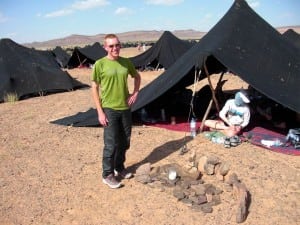 With few luxuries and much time, I built a rock oven with wind shield one day. Photo by Michael Wardian.