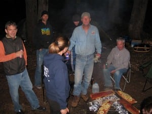 Thornley (standing in blue shirt) leads a trail crew.