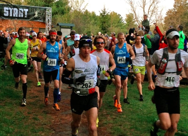 Max King leading off the Ice Age 50 on his way to a shiny course record and WS100 entry. Photo: iRunFar/Nicholas Wied