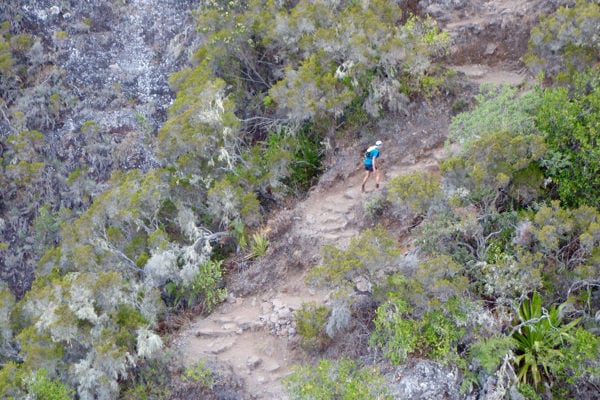 Andrea Huser on the 2,000-meter climb leading to Maïdo at 115 kilometers into DdF. Photo: iRunFar/Meghan Hicks