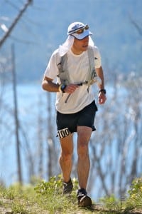 Jose Suarez arriving Duncan Canyon, the first crewed aid station at mile 25. Photo by Glenn Tachiyama. Jose Suarez Duncan Canyon 2010 Western States 100