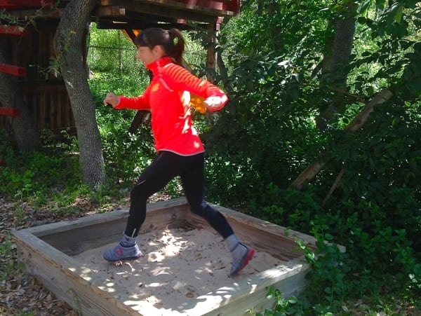 Liza sandbox training in her backyard. Photo courtesy of Liza Howard.