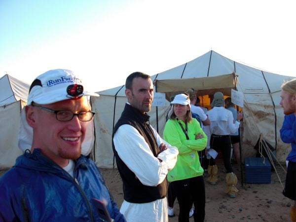 Waiting in line to write email at Marathon des Sables Mandatory gear MdS